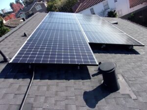 Solar panels with visible electrical conduit on a residential roof by Element Power Systems, Inc. in Brentwood, CA