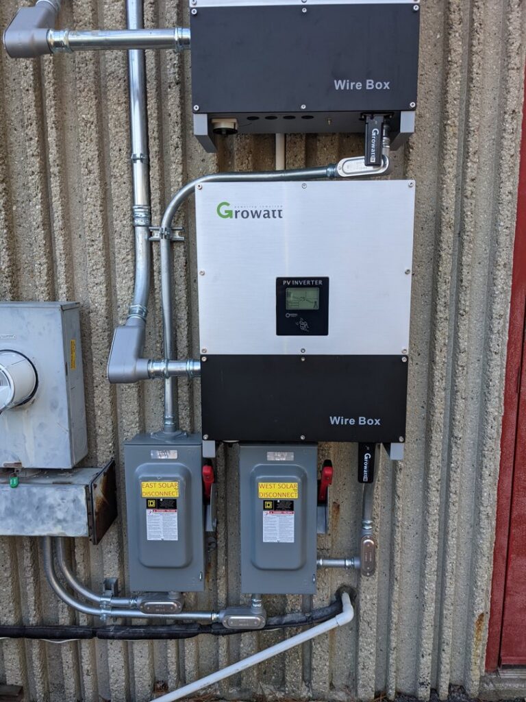 A solar PV inverter and electrical boxes installed by Bright Electric in Evansville, IN.
