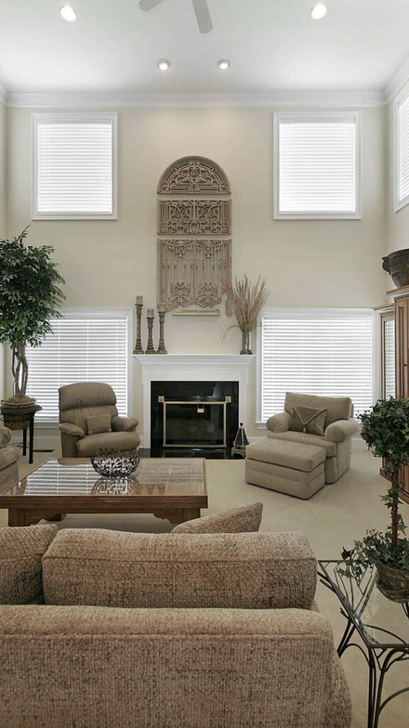 A spacious living room with elegant beige carpet, expertly installed by Great Northern Flooring in Bensenville, IL.