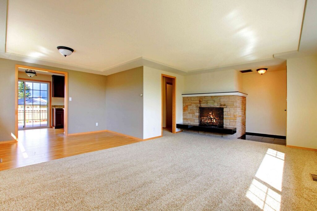 A spacious living room with clean, light-colored carpet by My Carpet Cleaner Nashville, TN