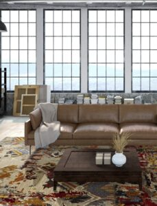 A spacious living room featuring a large, colorful patterned area rug, provided by Odino Designs, llc in Portland, OR.