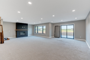 A spacious living room illuminated by recessed lighting, installed by Power Plus Electric LLC in Rochester, MN.