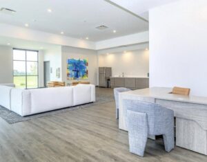 A spacious open room with new wood-look flooring installed by Keystone Carpet & Tile in Omaha, NE.