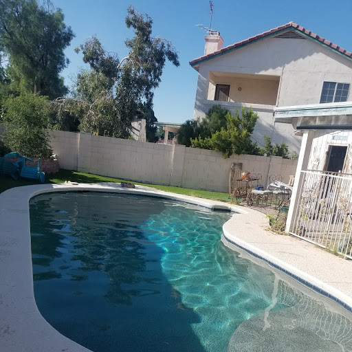 A sparkling clean swimming pool, maintained by Up Keep Pool & Spas for residents in Tucson, AZ.