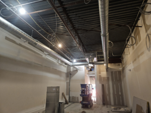 Installation of spiral HVAC ductwork in a commercial building by Acclimated Air LLC in Virginia Beach, VA.