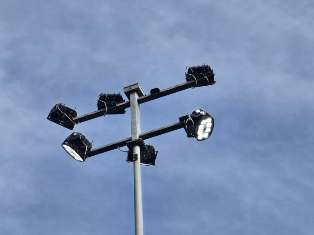 A large sports field lighting fixture with multiple LED lights installed by TET Light Solutions LLC in Cedartown, GA.