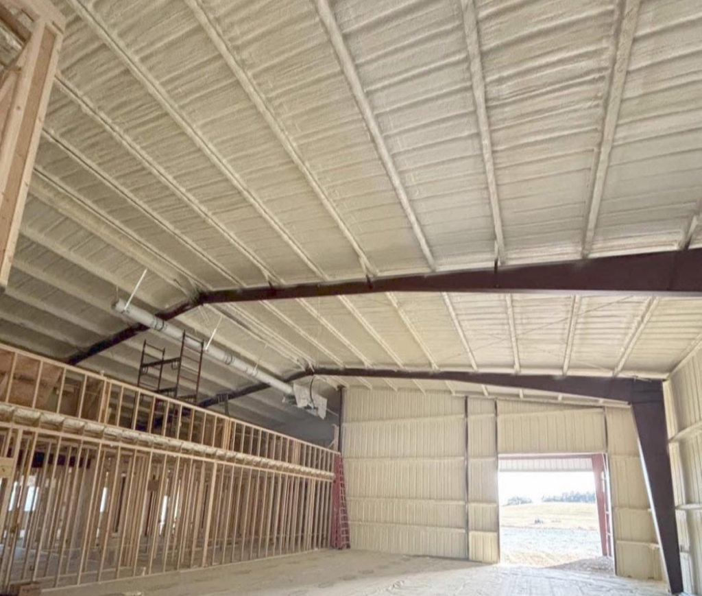 Spray foam insulation being installed in a commercial building by Bennett Heating, Cooling & Electrical in Batesville, AR