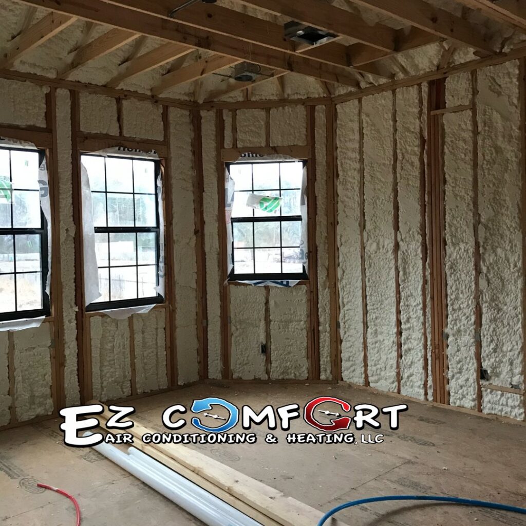 Spray foam insulation being installed in a room under construction by EZ Comfort Air Conditioning & Heating LLC in Humble, TX.