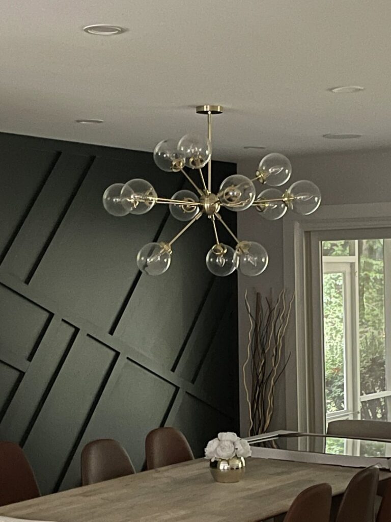 Modern sputnik-style chandelier installed in a dining room by Armenergo Electrician in Rockville, MD