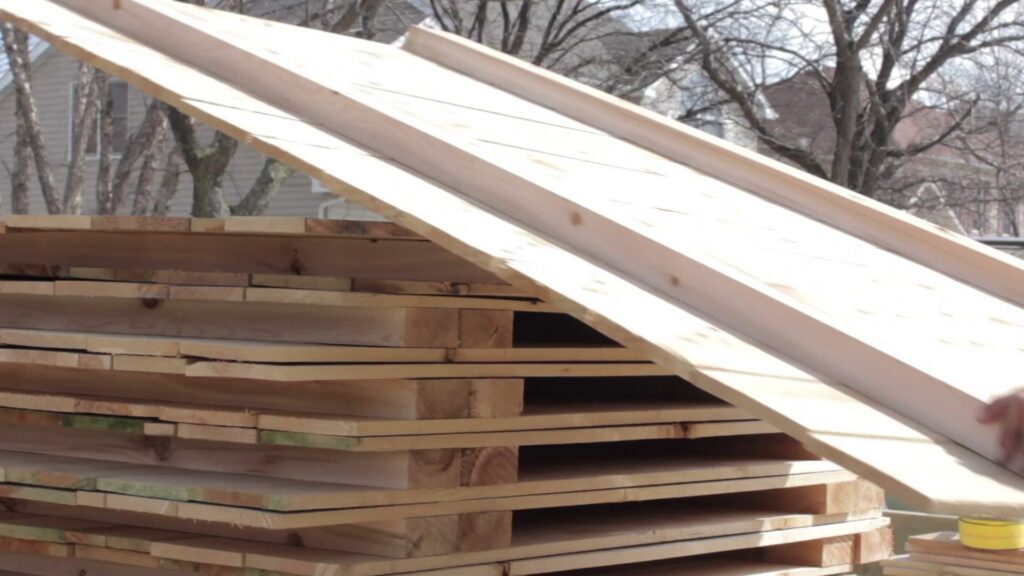 Stacked wood fence panels ready for installation by Cedar Mountain Fence Company in Plainfield, IL.