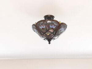 A decorative stained glass flush mount light fixture installed by C. C. Taylor Electric LLC in Powhatan, VA.