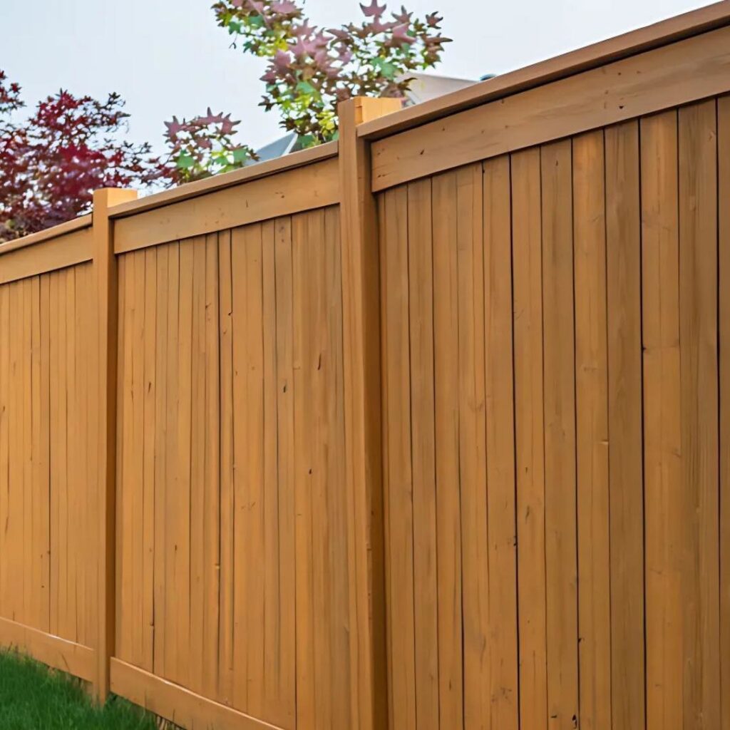 A beautifully stained wood privacy fence installed by Midwest Legacy Fence & Deck, providing a natural look in Aurora, IL.