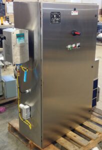 A large stainless steel electrical control panel with external controls and a digital display, installed by Basic Supply in Lafayette, LA.