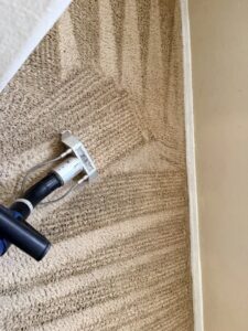 Stair carpet cleaning in progress, showing before and after results, by KD Carpet Cleaning in Cape Coral, FL