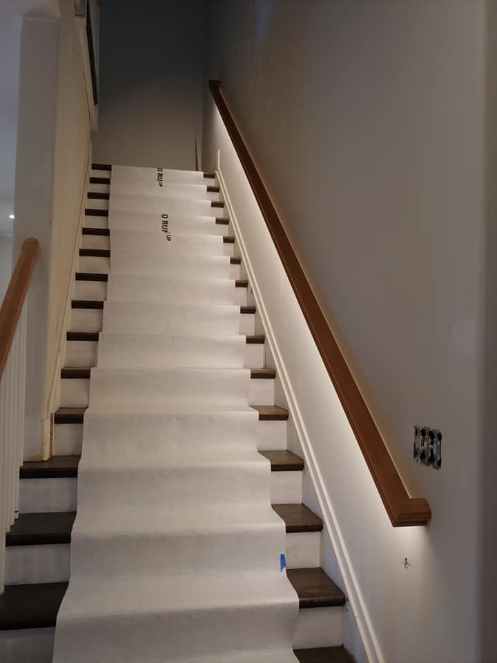 Custom staircase LED strip and step lighting installation by EFS Electric Inc in Wilmington, DE.
