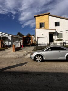 A Stanley Steemer service van with cleaning equipment at a residential job site in Azusa, CA.