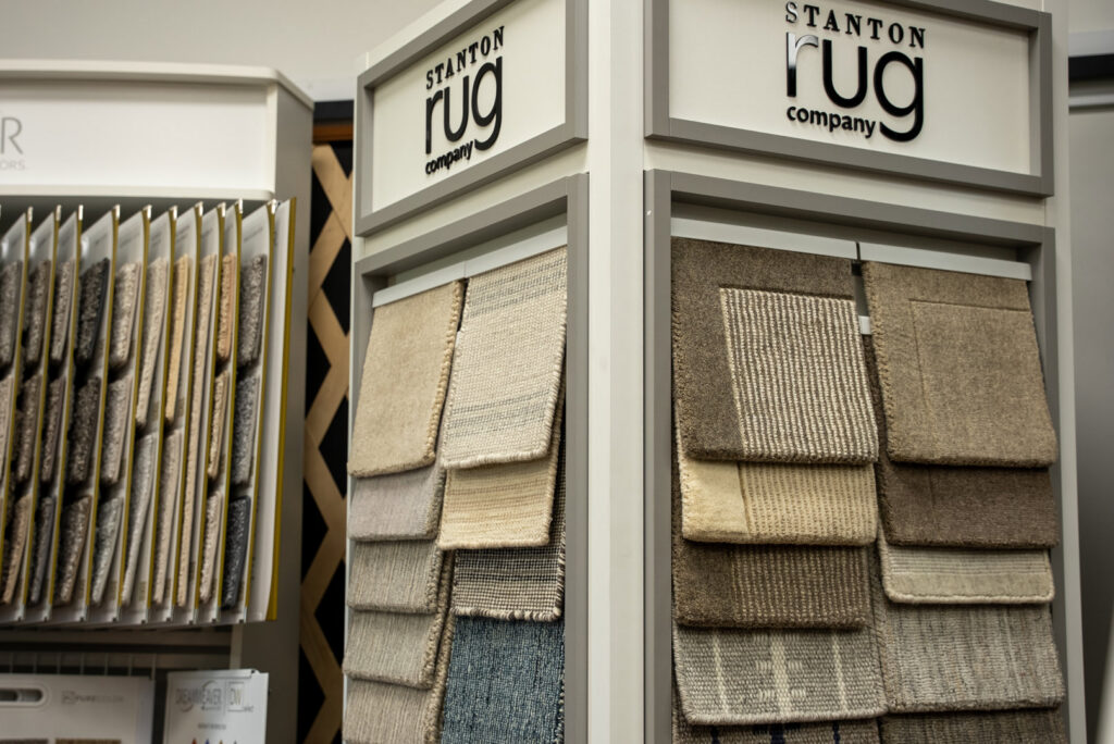 Various carpet samples from Stanton Rug Company displayed at Grain Design Flooring in Florence, KY.