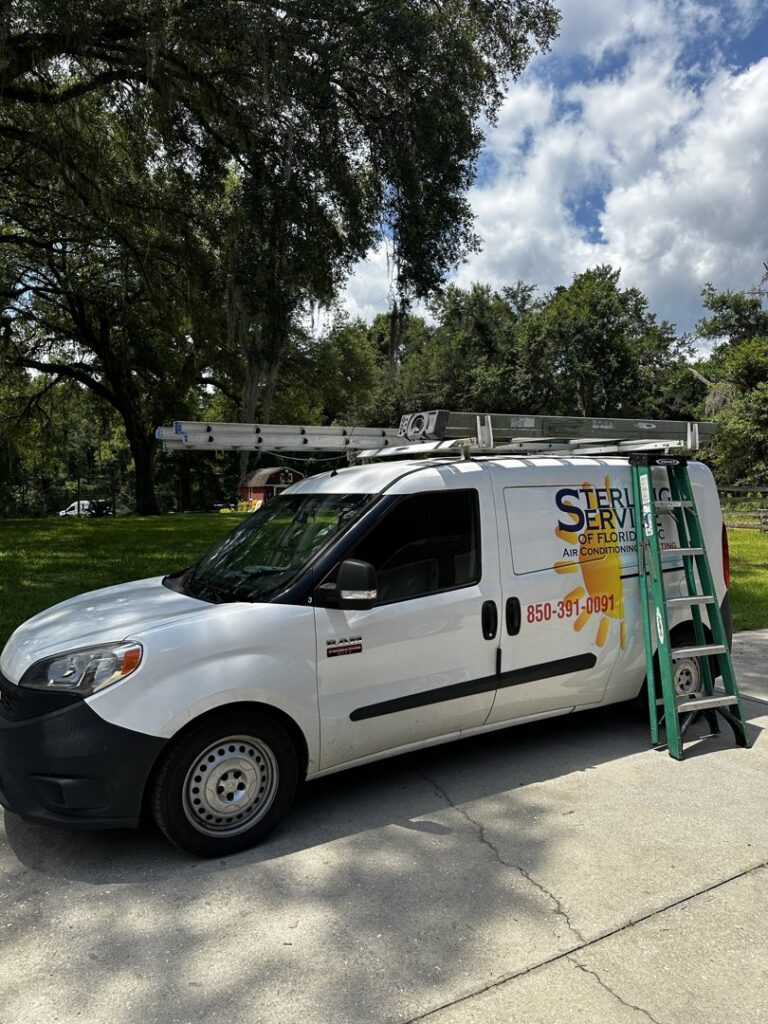 A Sterling Service of Florida Inc HVAC service van with ladders parked in Tallahassee, FL.