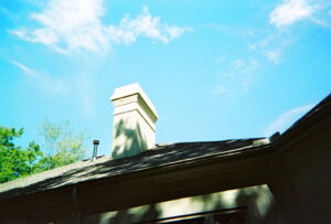 A well-maintained stucco chimney exterior on a house by Centerville Pipestone Chimney Services LLC in Dayton, OH.