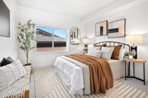 A stylish bedroom with a newly installed carpet by Vogel's Carpet & Flooring in Seattle, WA