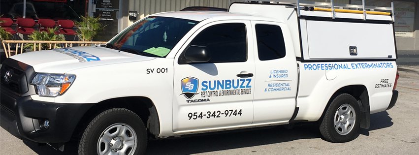 A Sunbuzz Pest Control & Environmental Services truck parked outside a commercial building in Fort Lauderdale, FL.