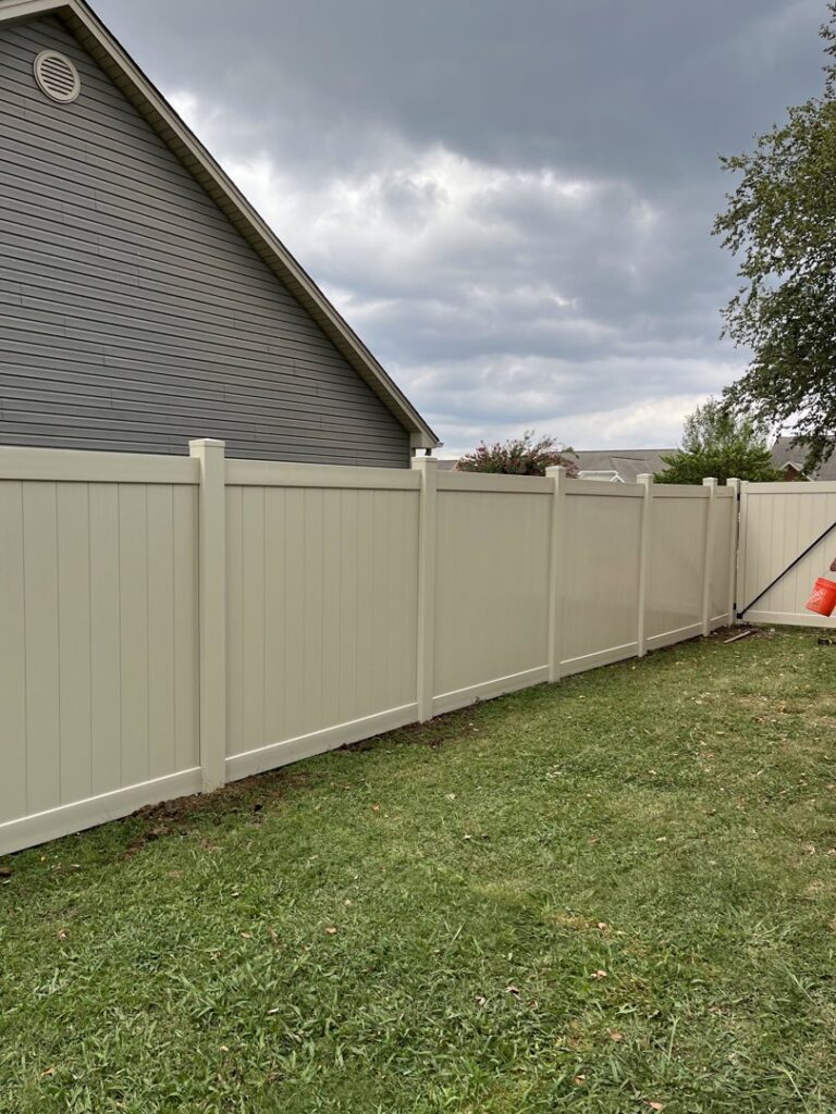A tan vinyl privacy fence installed by Fantastic Fences in Chattanooga, TN