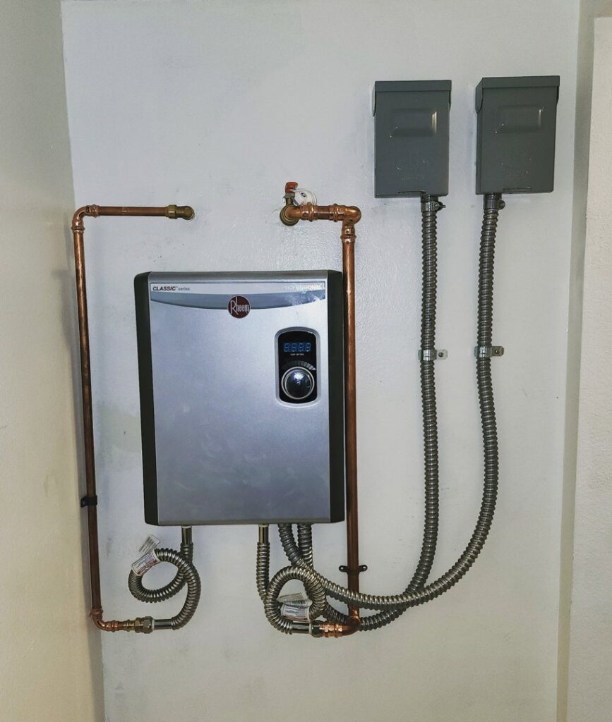 Tankless water heater electrical installation by Elite Electrical Concepts, LLC in Deerfield Beach, FL.
