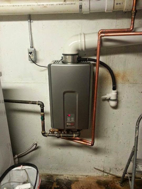 A tankless water heater installation with copper piping by Complete Comfort Heating & Cooling in Kenosha, WI.