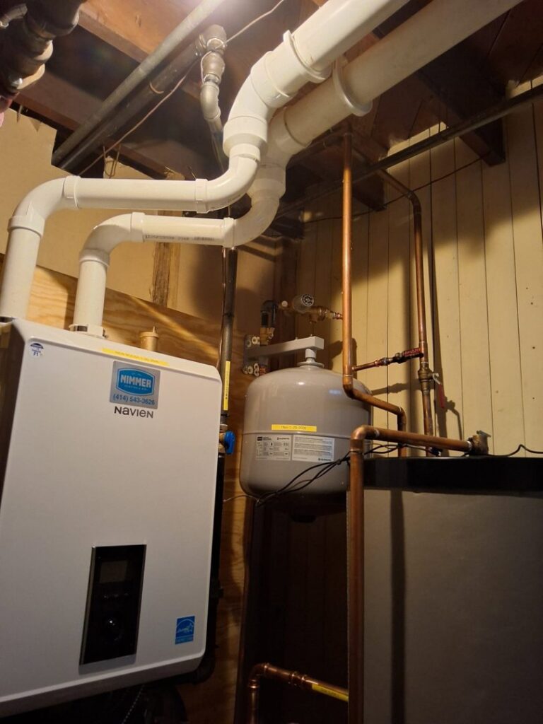 A tankless water heater and copper piping installed by Nimmer Heating & Air Conditioning in Milwaukee, WI