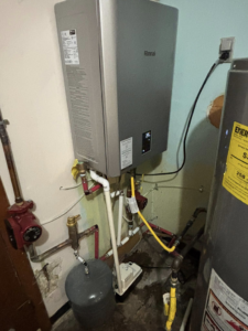 A Rinnai tankless water heater installation by Premier HVAC/ Small appliance in Brooklyn, NY.