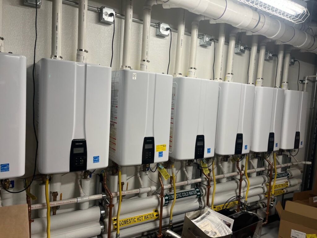 Multiple tankless water heaters installed with new piping by R.J. O'Neil Inc. in Montgomery, IL.