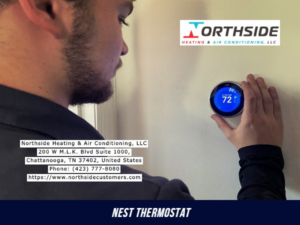 A technician adjusting a Nest smart thermostat for Air Conditioning Repair Service in Chattanooga, TN
