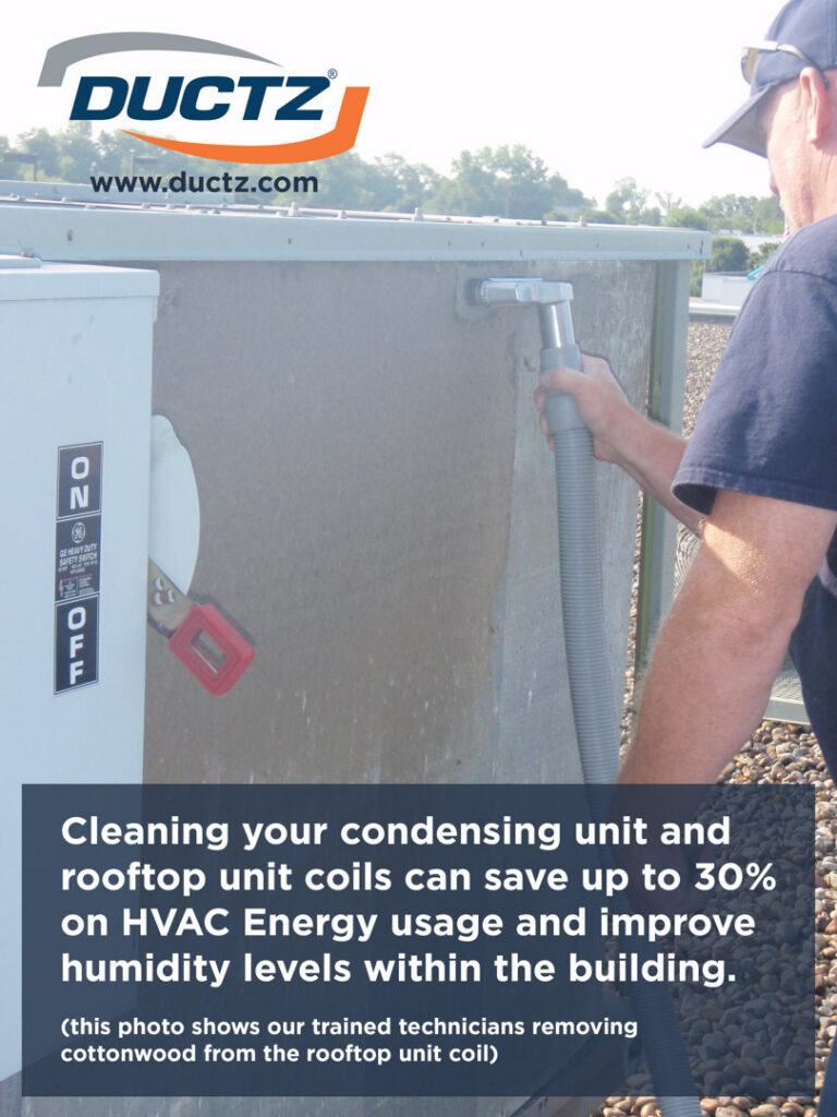 A technician cleaning a rooftop HVAC condensing unit coil for Ductz of Southeast Michigan in Livonia, MI.