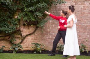 A Mosquito Shield of Savannah technician consulting with a client about pest control in Savannah, GA.