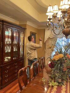 A Target Pest Control technician inspecting a home's interior for signs of pests in Manchester, CT.