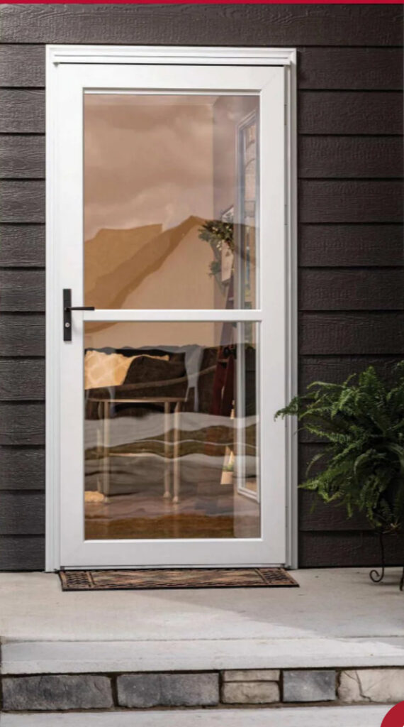 A technician on a scissor lift installing a garage door opener for Ozarks Overhead Door & More in Springfield, MO.