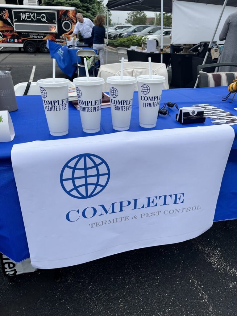 A pest control technician with a backpack sprayer and fogger tool from Complete Termite & Pest Control in Mason, OH.
