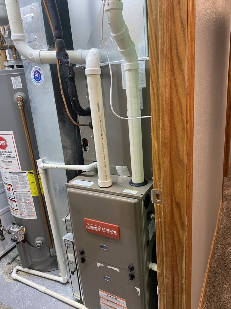 A technician servicing an outdoor air conditioning unit for a client of Climate Solutions. Inc. in Cape Coral, FL.