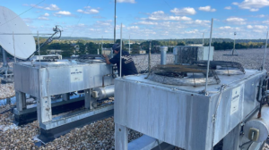 A technician servicing large commercial rooftop HVAC units for Mason Mechanical Services LLC HVAC Frederick Md in Jefferson, MD.