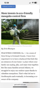 A GeoMosquito LLC technician spraying a residential backyard for mosquito control in Roswell, GA