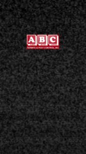 A pest control technician from ABC Termite & Pest Control, Inc spraying bushes with a backpack sprayer in Lincoln, NE.