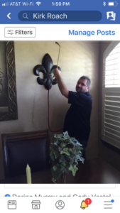 A technician from Roach's Termite Service Inc. spraying for pests indoors in Oklahoma City, OK