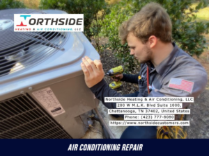 A technician using a drill to repair an outdoor air conditioning unit for Air Conditioning Repair Service in Chattanooga, TN