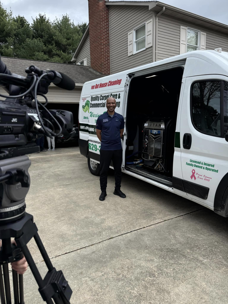 A technician standing by a truck-mounted carpet cleaning unit from Worm's Quality Carpet Care & Commercial Cleaning, LLC in Seaford, DE.