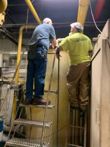 R.J. O'Neil Inc. technicians inspecting industrial equipment and piping in Montgomery, IL.