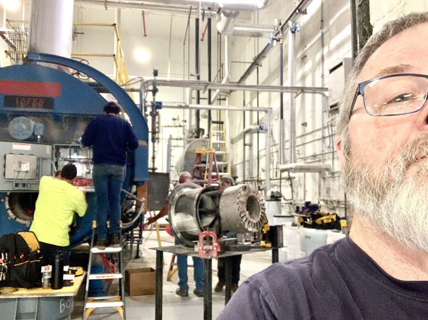 Technicians performing maintenance on a large industrial boiler for BJ Muirhead Co., Inc. in Orchard Park, NY.