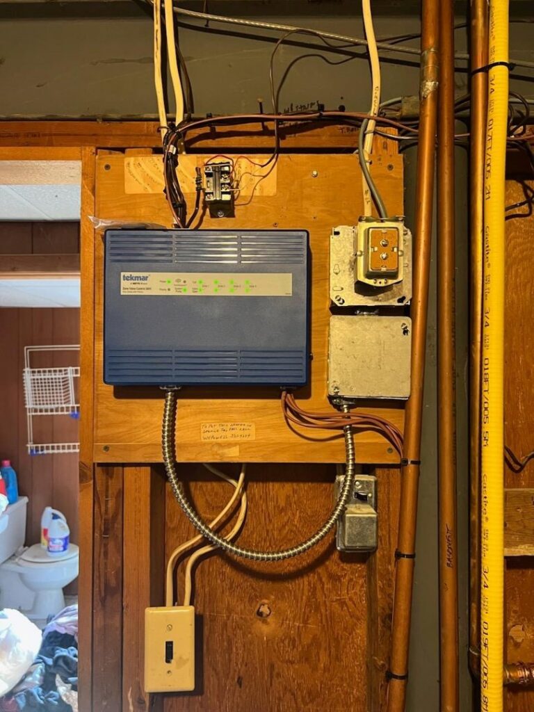A Tekmar control panel for a hydronic heating system installed by Neal Harris Service Experts in Overland Park, KS.
