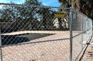 Temporary chain-link fencing for a construction site by Nash Fence & Supplies Inc. in Lake Charles, LA.