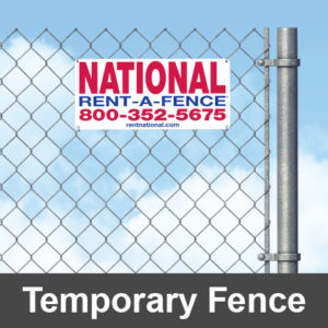 A temporary chain-link fence with a "Rent-A-Fence" sign by National Construction Rentals in Las Vegas, NV.