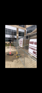Temporary chain-link fencing with 'Construction Area' signs installed by Lynch's Temporary Fencing & Dumpster rental in Bossier City, LA.